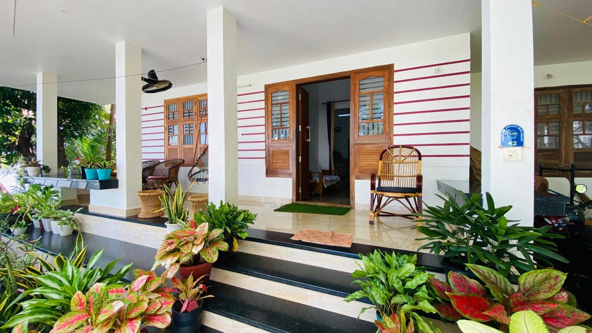 Green Island Homestay Riverside Кожикоде Экстерьер фото