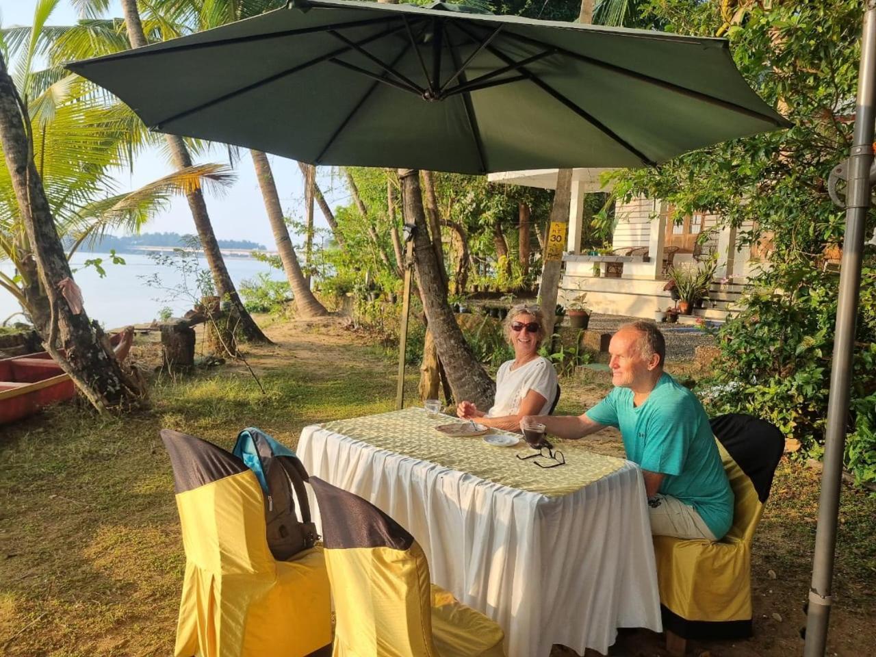 Green Island Homestay Riverside Кожикоде Экстерьер фото